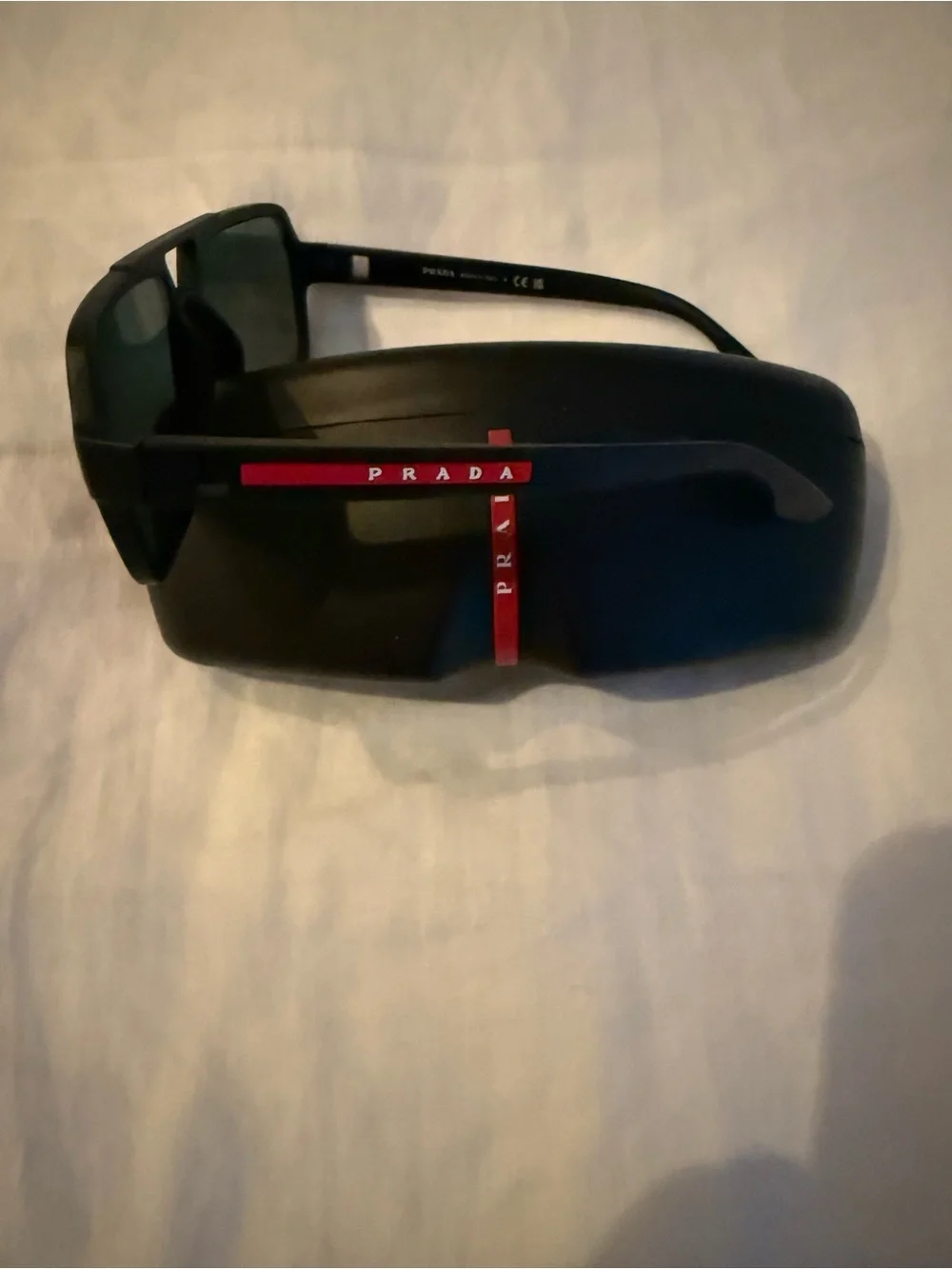 Prada linea rossa Black Frame Sunglasses with Red Gradient Lenses